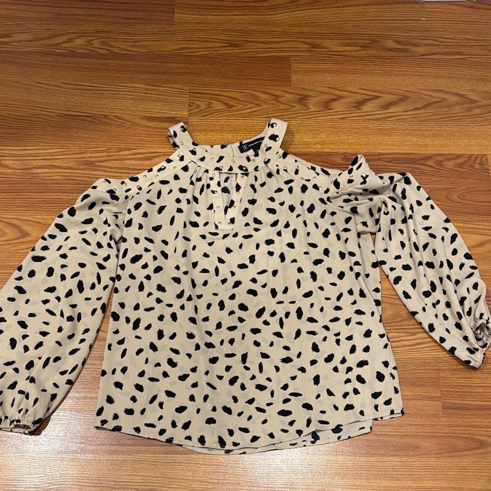 Women's Cream and Black Cold Shoulder Top with gold embellishments
